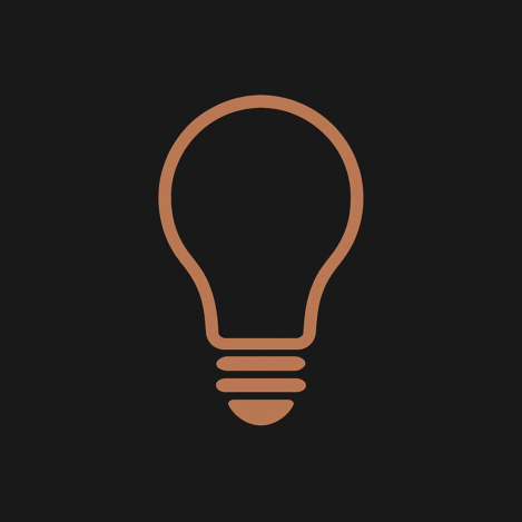 Icône ampoule cuivre – SL Électricité Icône cuivrée représentant une ampoule électrique sur fond noir, symbole des services en électricité générale de SL Électricité à Metz et Thionville.
